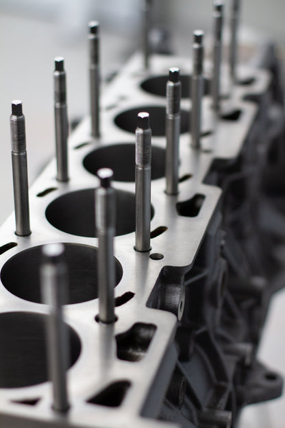 metal head studs in engine block 