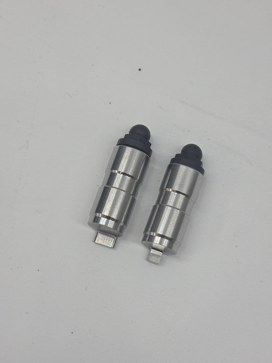 silver and black engine checking lifter on white background