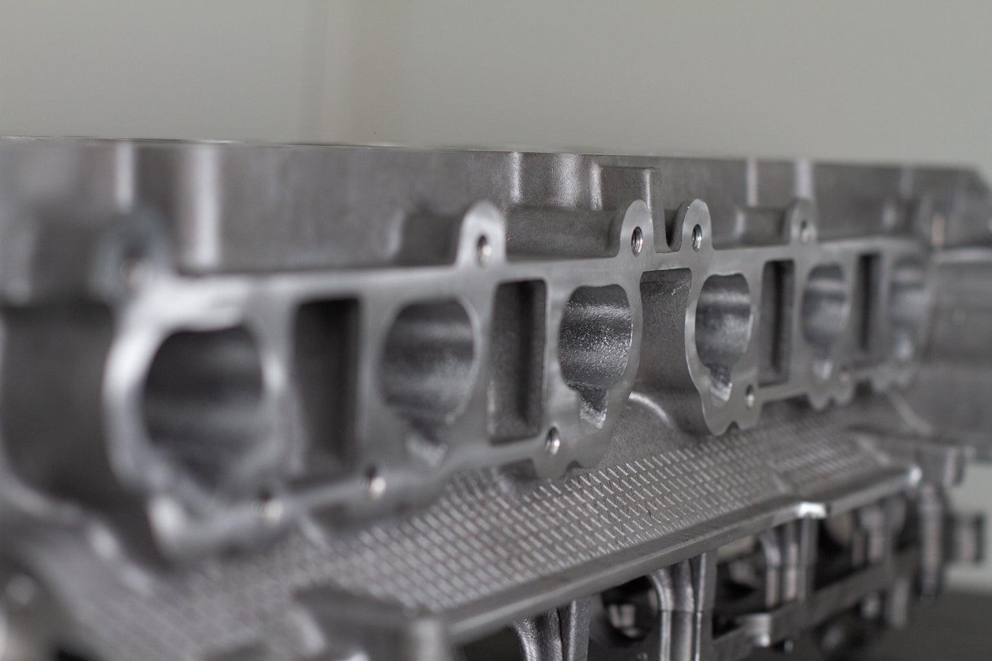 metal engine cylinder head with white background
