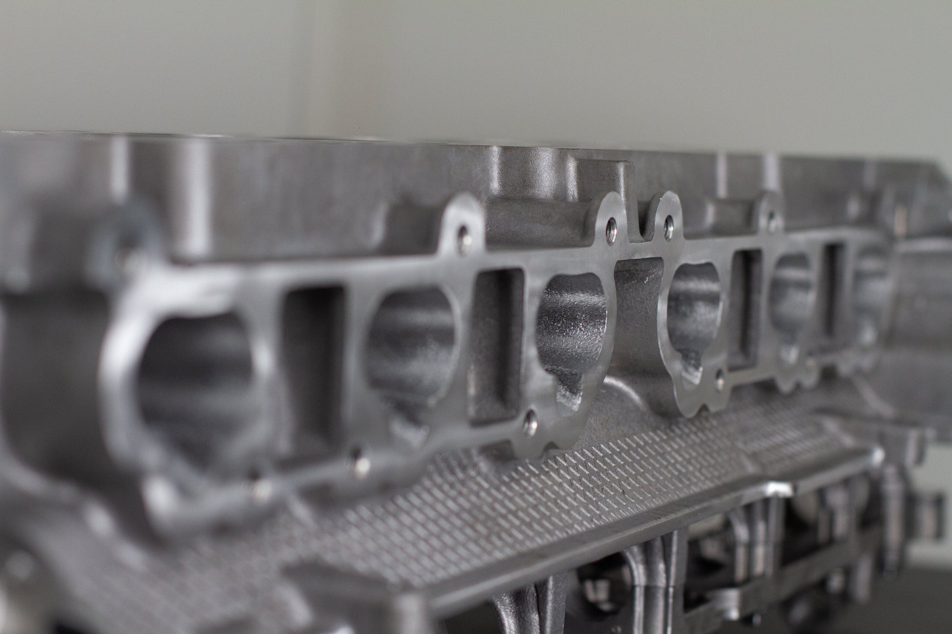 metal engine cylinder head with white background